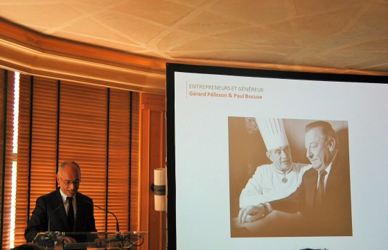 Hervé Fleury, CEO of L'Institut Paul Bocuse, addressing Press at Le Pavillon Ledoyen, photo copyright Paige Donner